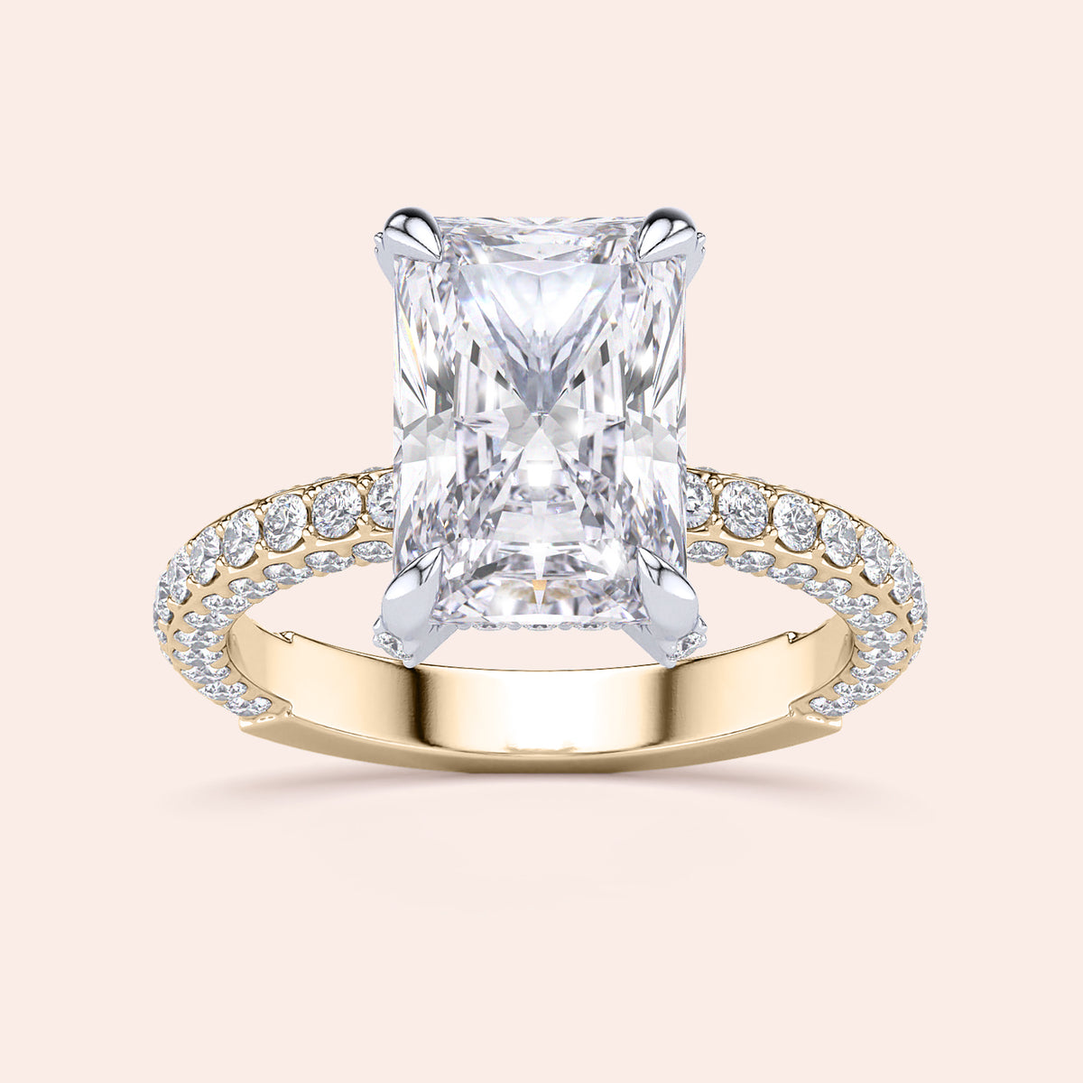 Two-tone 14K/18K white and yellow gold engagement ring with emerald-cut diamond and hidden halo design. 