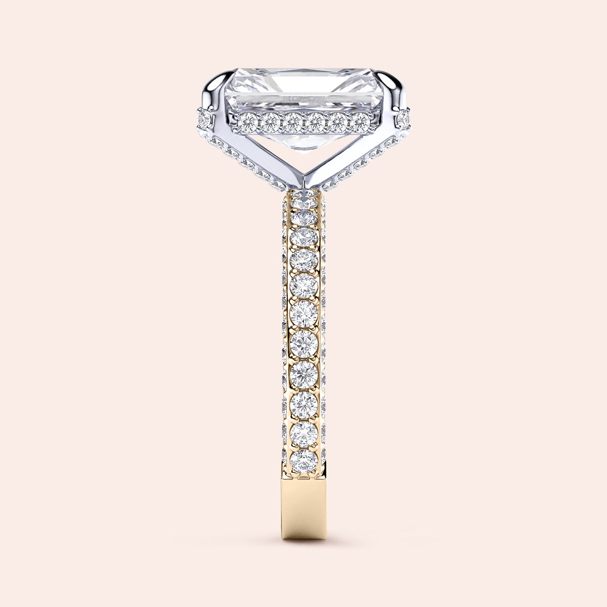 Two-tone 14K white and yellow gold emerald-cut diamond engagement ring with radiant hidden halo and 3D pave design. 