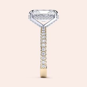 Two-tone 14K white and yellow gold emerald-cut diamond engagement ring with radiant hidden halo and 3D pave design. 