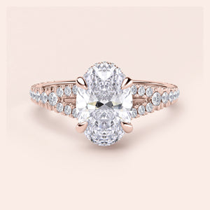 Oval Diamond Engagement Ring in 14K Rose Gold, featuring a split shank and hidden halo design, perfect for a timeless proposal.