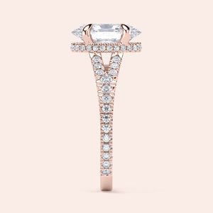 Elegant rose gold engagement ring in 14K/18K with radiant cut diamond center, halo, and pave setting of sparkling diamonds.