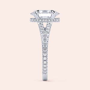 Elegant 14K/18K white gold engagement ring with emerald-cut diamond, showcasing aPave diamond band and halo detail.