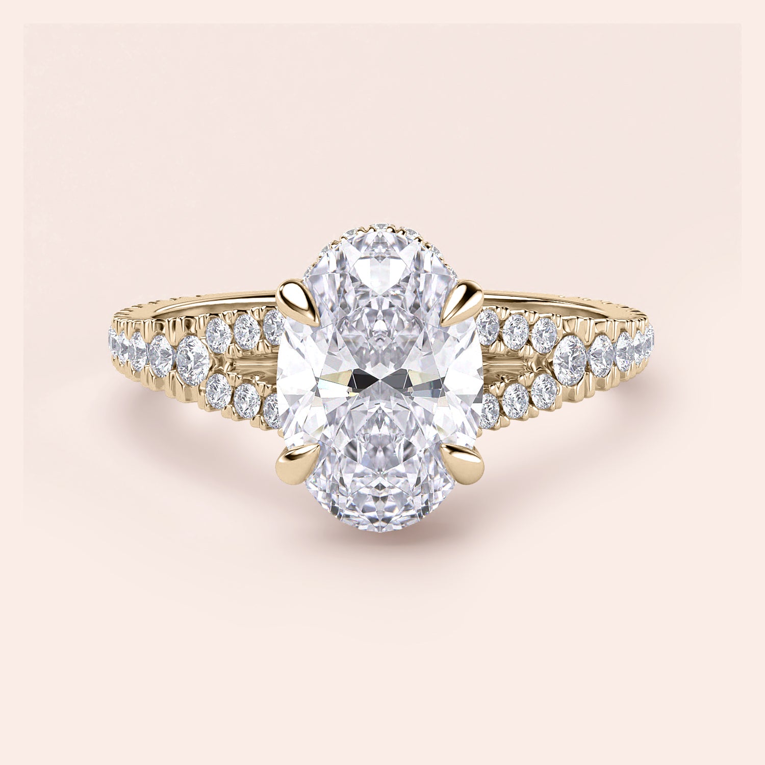 Elegant 14K gold solo engagement ring featuring an oval-cut diamond with a split shank and round diamonds.|




#14KRecycledYellowGold
#18KRecycledYellowGold





