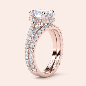 "Elegant rose gold engagement ring featuring a marquise-cut diamond, available in 14K, 18K, or platinum with a stunning halo."