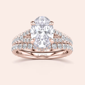 Rose gold bridal set with oval diamond center and round diamonds, available in 14K, 18K, or platinum. Elegant engagement ring design.