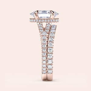 "Elegant 14K rose gold double band engagement ring with marquise-cut diamond and round brilliant accents."