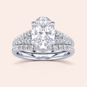 "Elegant white gold oval split shank hidden halo engagement ring, available in 14K, 18K, or platinum settings."