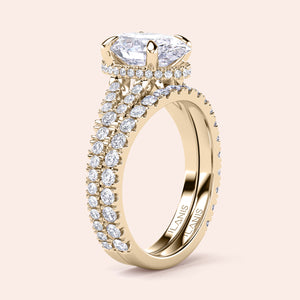 Stunning 14K yellow gold oval split shank hidden halo engagement ring with marquise diamond andPave side stones.