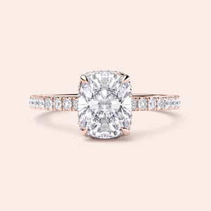 Elegant 14K or 18K rose gold engagement ring with cushion-cut diamond andPave diamond band for luxurious brilliance.