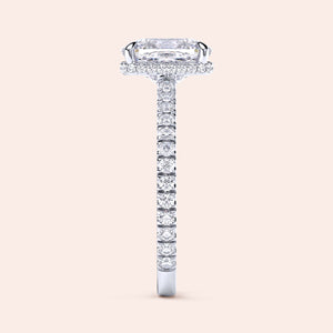 Elegant 14K white gold engagement ring with a radiant-cut diamond and sparkling round diamonds, perfect for your special moment.