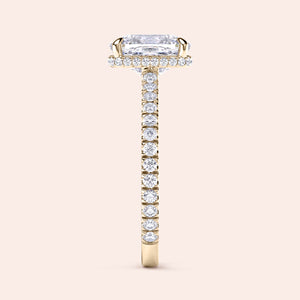 Elegant engagement ring in 14K yellow gold featuring a radiant-cut diamond and pave diamond band. Perfect for any proposal.