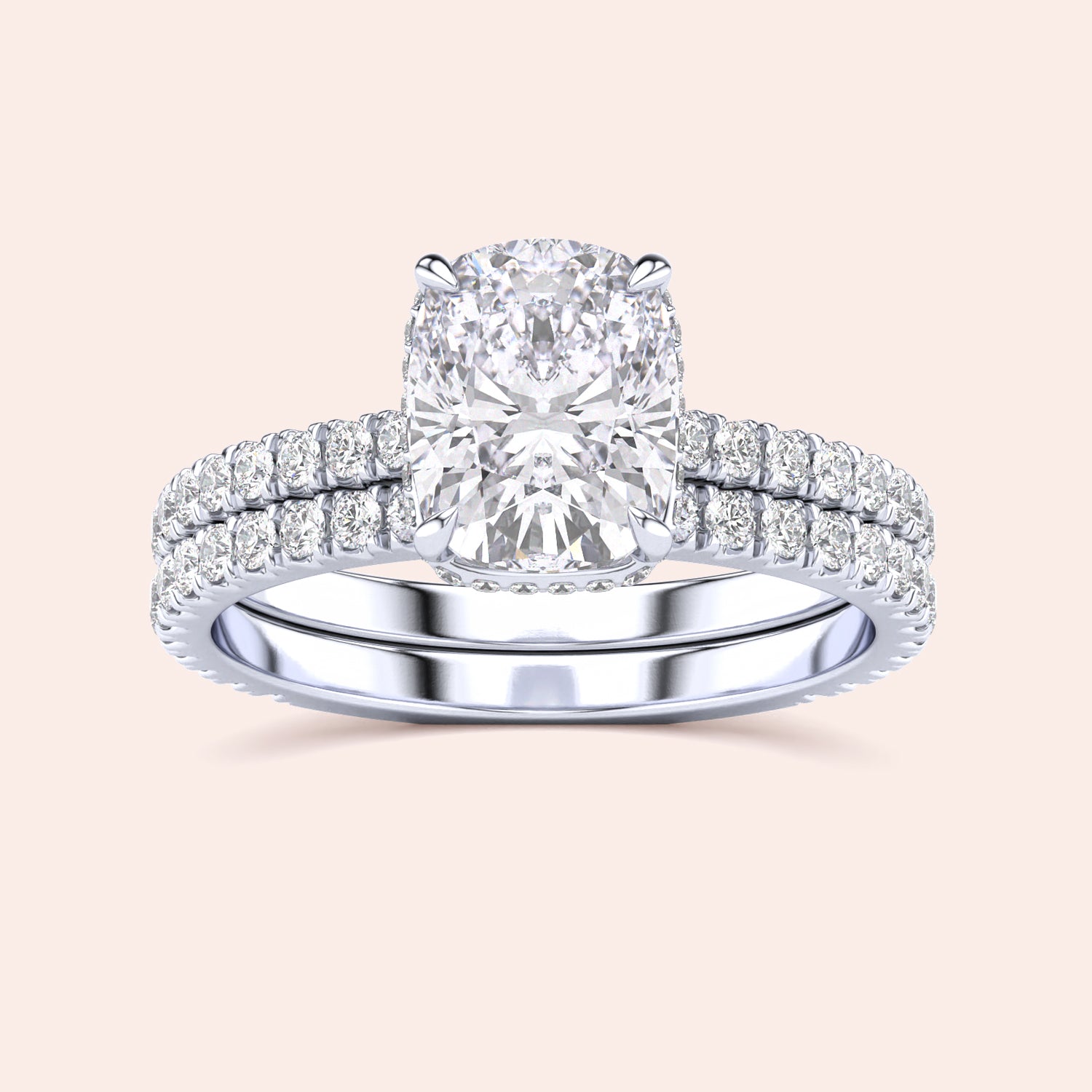 Elegant 14K white gold cushion-cut diamond engagement ring and wedding band set with halo, showcasing exquisite craftsmanship.|

#14KRecycledWhiteGold
#18KRecycledWhiteGold








#Platinum