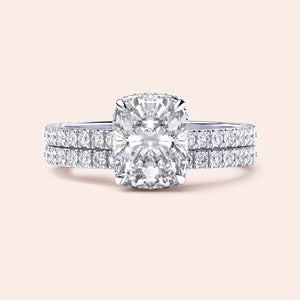 Elegant cushion-cut diamond engagement ring in 14K or 18K gold with dualPave bands, showcasing exceptional brilliance.