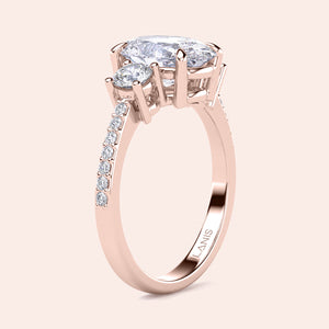 Elegant rose gold engagement ring with oval diamond and round accent stones, available in 14K, 18K, and platinum.