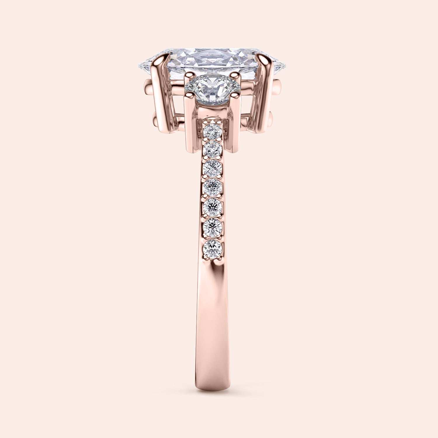 Elegant 14K rose gold engagement ring featuring an oval three-stone design with pave accents. Intricate side view detail.|







#14KRecycledRoseGold
#18KRecycledRoseGold


