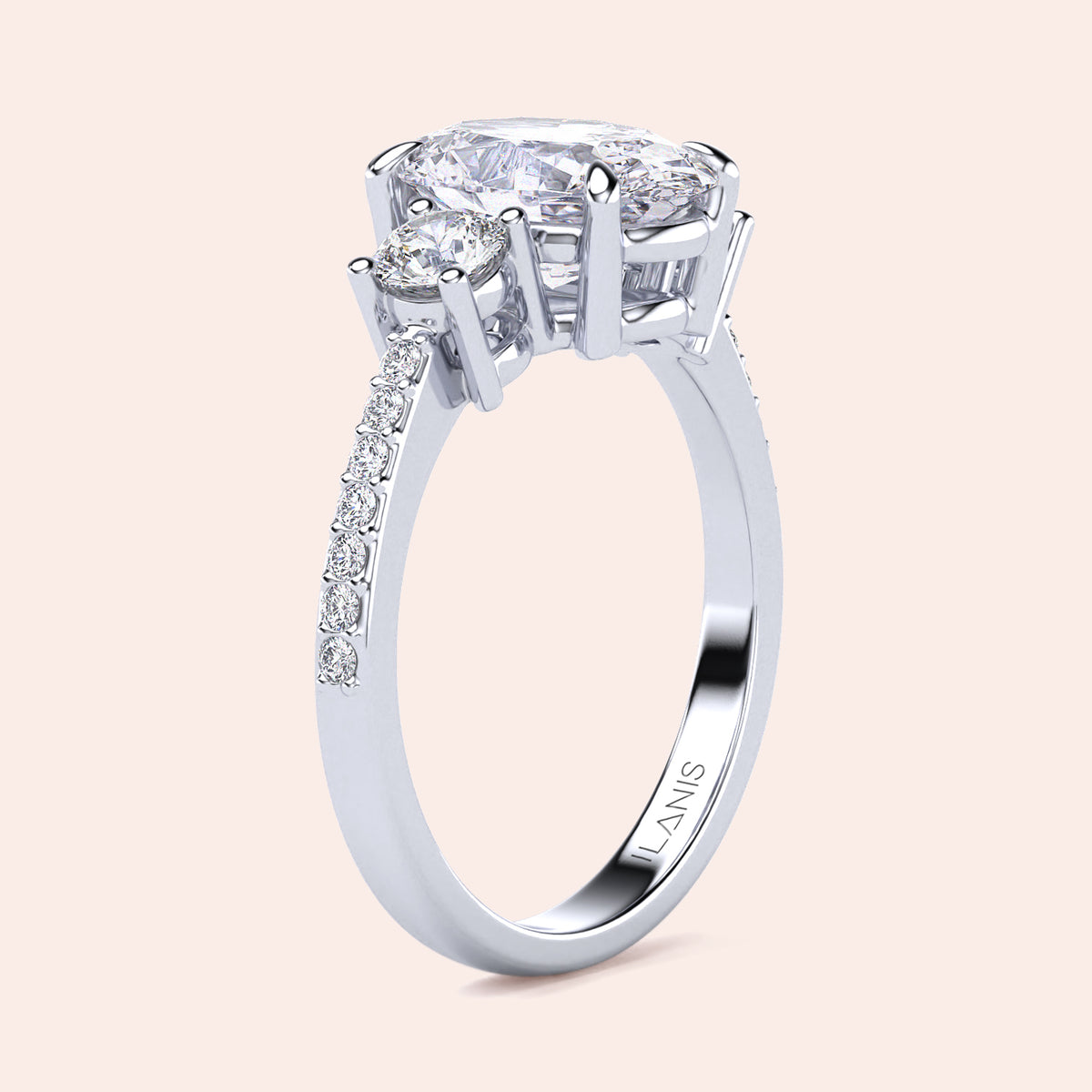 Elegant engagement ring featuring a marquise-cut diamond centerpiece and side stones, set in 14K or 18K white gold or platinum.