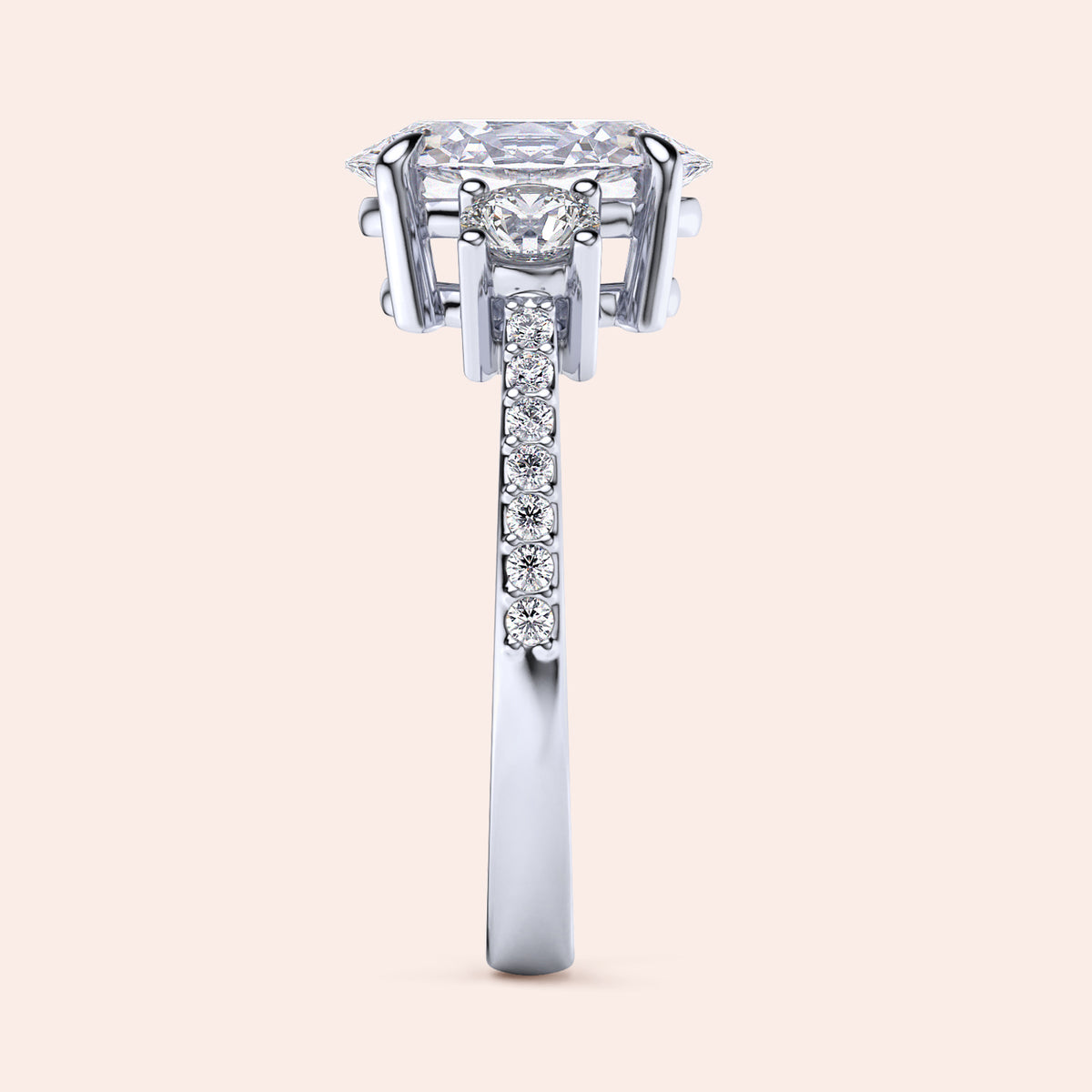 Marquise-shaped diamond engagement ring in 14K or 18K gold or platinum, featuring smaller diamonds on the band for added elegance.