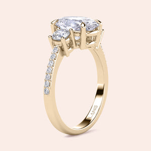 Elegant 14K yellow gold diamond engagement ring featuring an oval-cut center stone with accent diamonds, shown unworn.