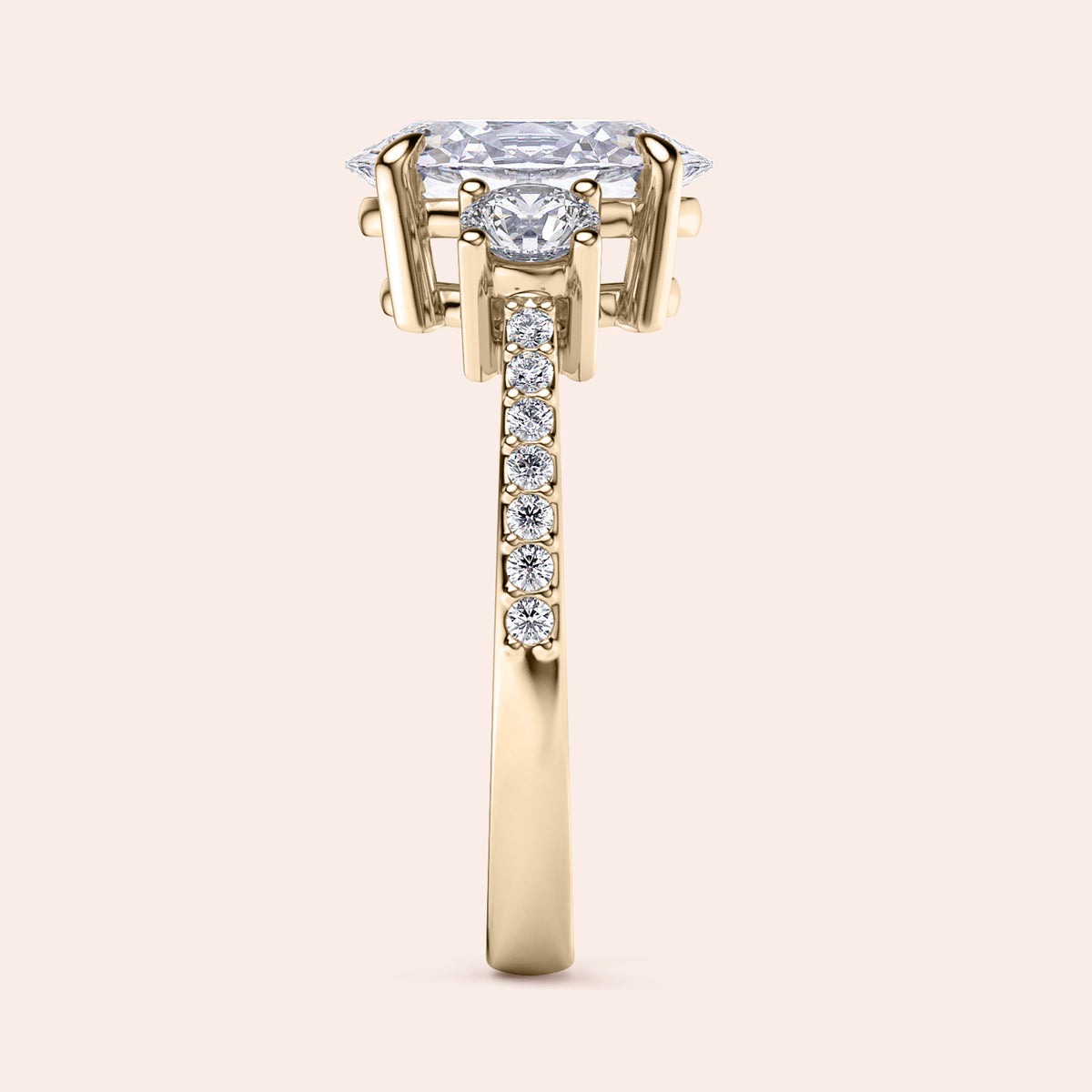 Elegant 14K or 18K gold engagement ring with an oblong octagon diamond and round accents, not worn on model.