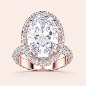 Luxurious 14K/18K rose gold engagement ring featuring an oval diamond halo and diamond-encrusted band, perfect for any occasion.