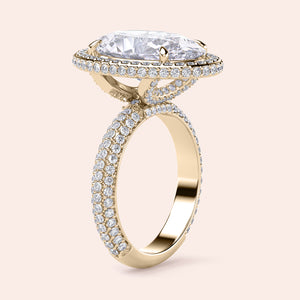 14K Gold Oval Double Edge Halo Engagement Ring with Pave-Set Diamonds, elegantly displayed on a light background.