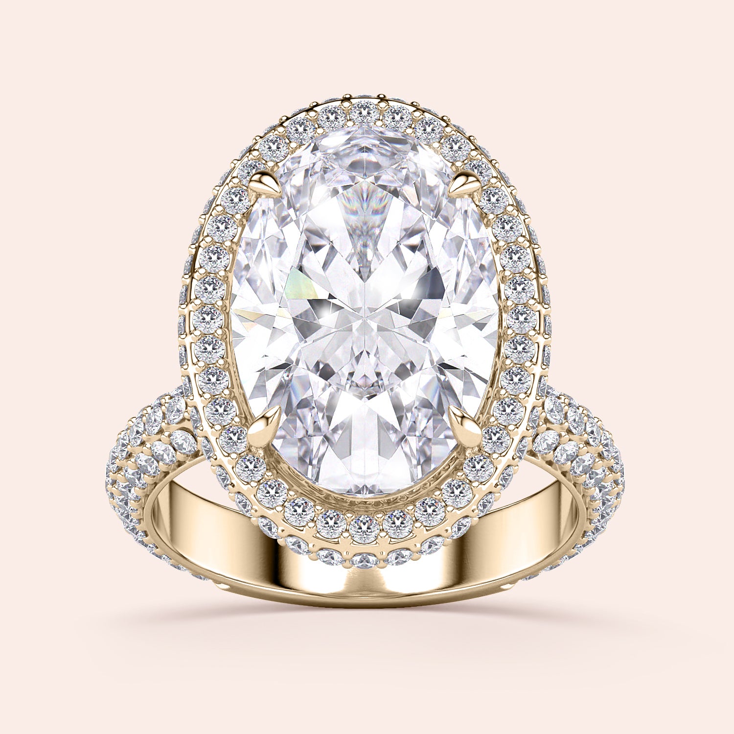 Elegant oval-shaped diamond engagement ring in 14K or 18K yellow gold, featuring a double halo of dazzling smaller diamonds.|




#14KRecycledYellowGold
#18KRecycledYellowGold





