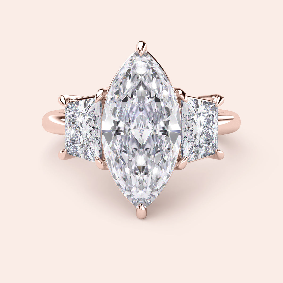Exquisite three-stone engagement ring in 14K or 18K rose gold, featuring marquise and square-cut diamonds for a stunning look.