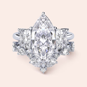 Elegant 14K or 18K gold or platinum engagement ring with a square diamond shape, worn on a model's hand, featuring accent diamonds.