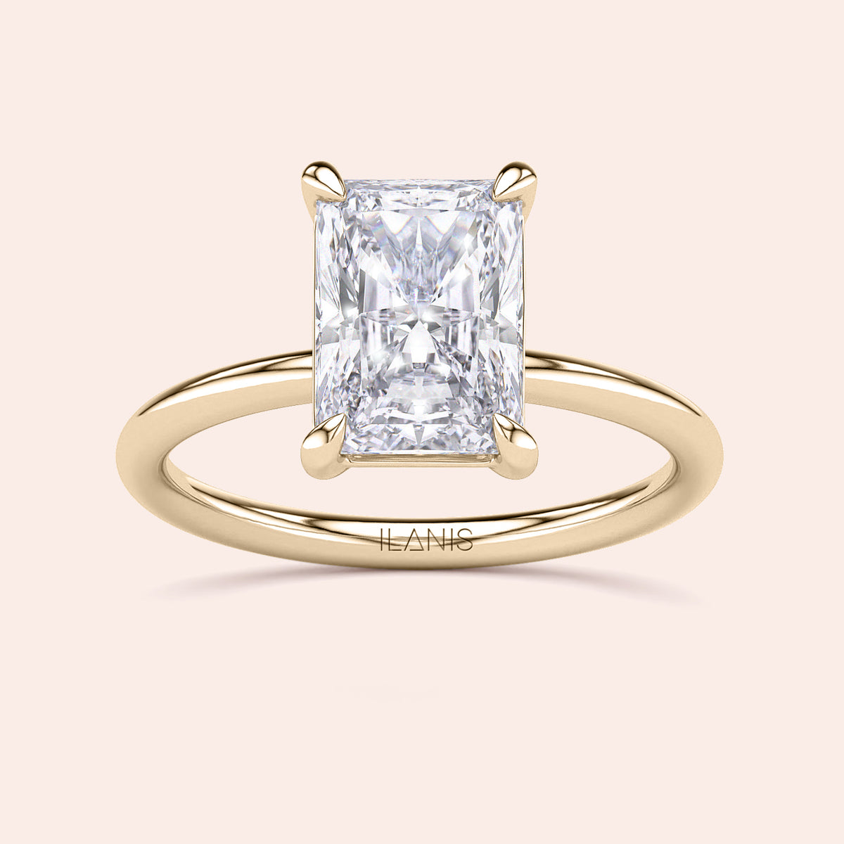 Radiant-cut diamond solitaire ring in 14K yellow gold, a timeless engagement choice for modern brides.