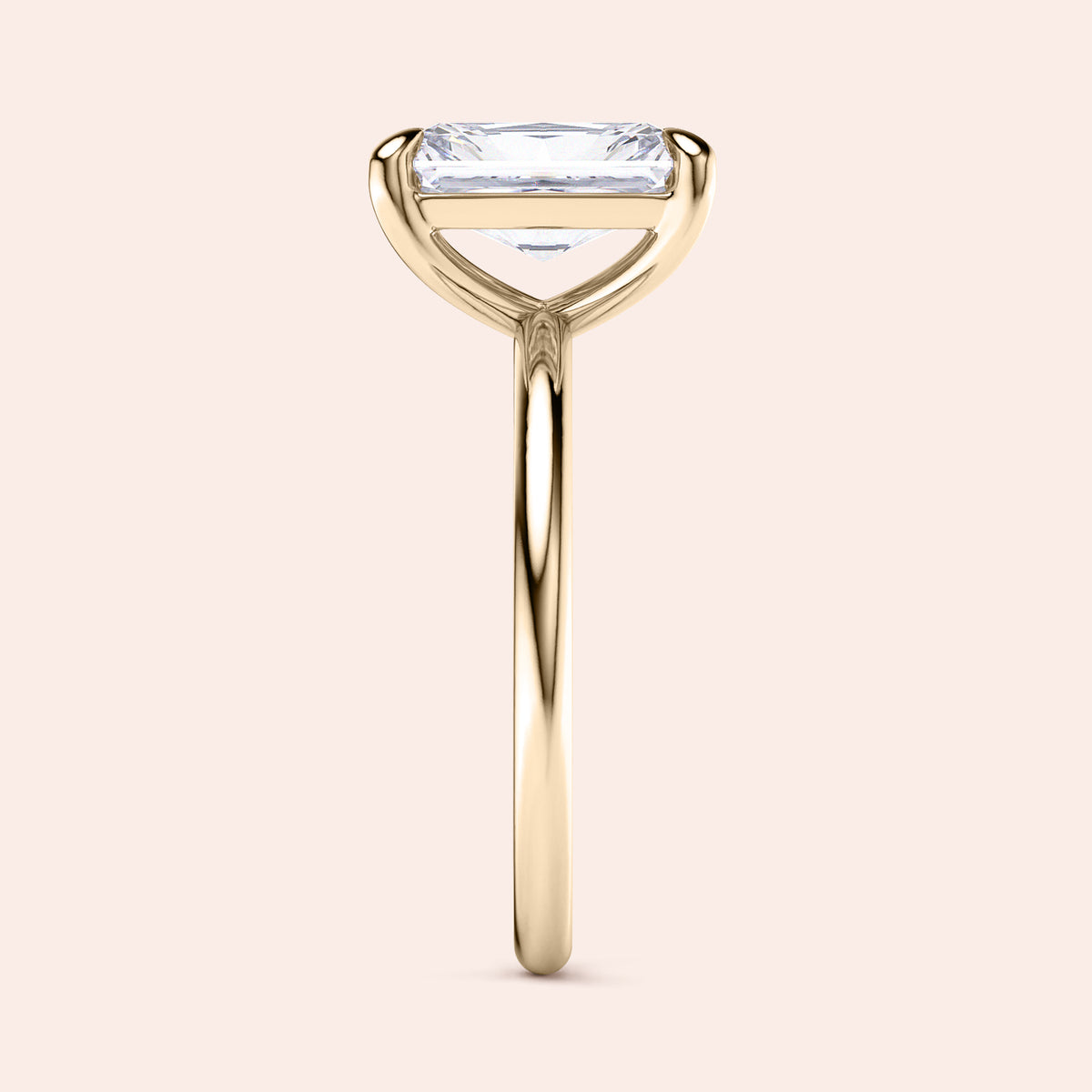 Elegant 14K Yellow Gold Engagement Ring with Radiant Cut Diamond, Side View - Classic Solitaire Design for Timeless Beauty.
