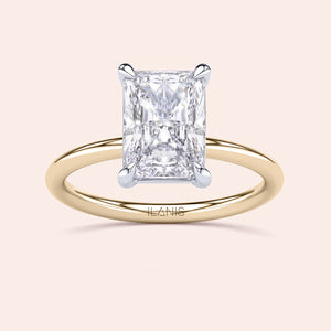 Two-tone 14K/18K white and yellow gold engagement ring with radiant diamond, perfect for a classic, elegant look. 