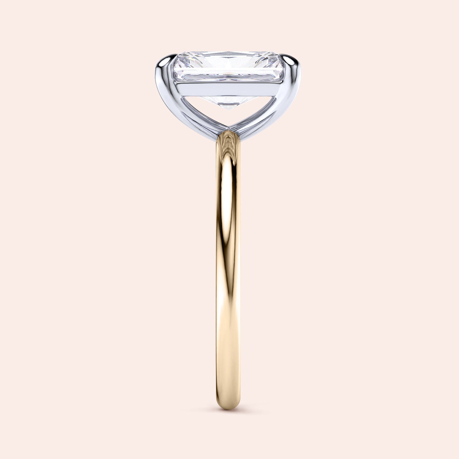 Two-tone 14K/18K gold ring featuring an emerald-cut diamond in classic solitaire design, blending white and yellow gold. |
#14KRecycledYellow/WhiteGold
#18KRecycledYellow/WhiteGold 