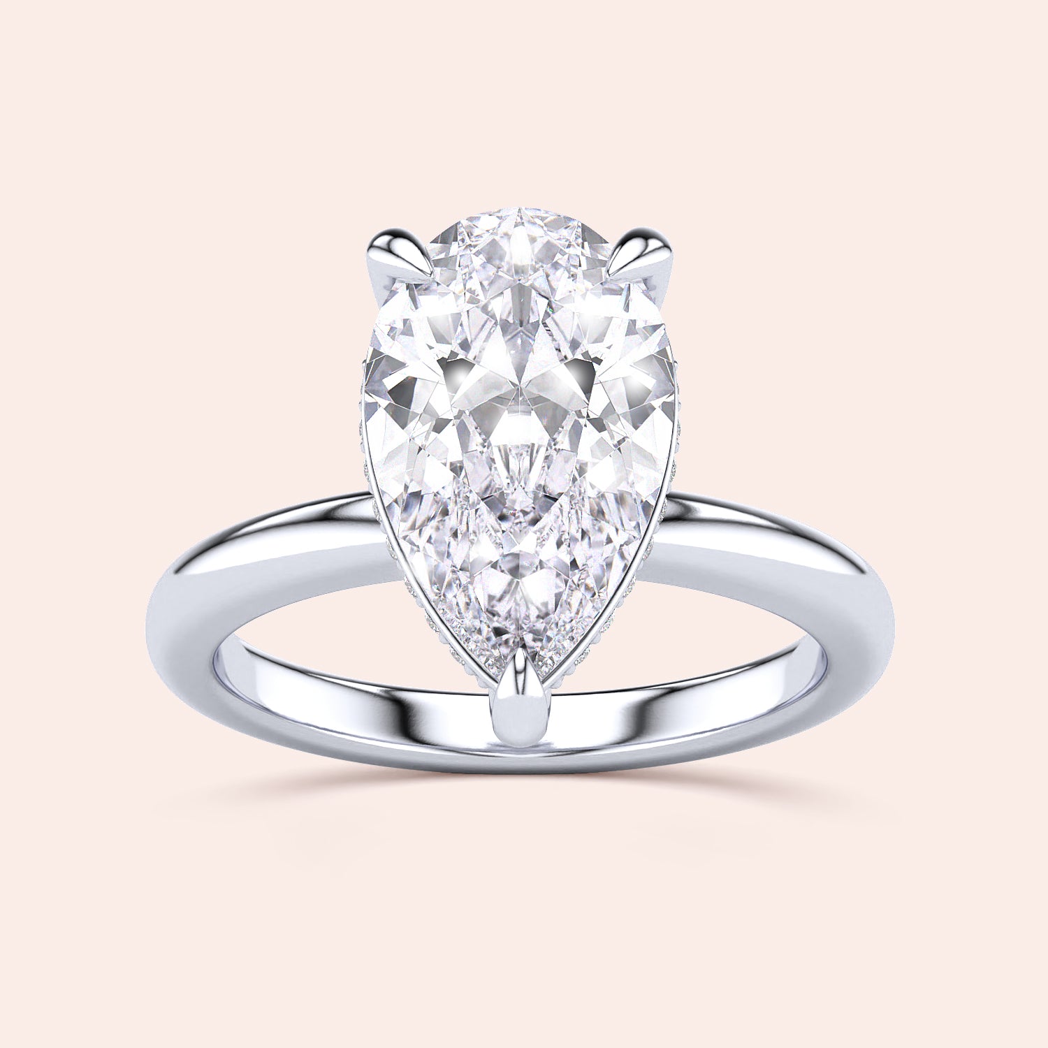 Elegant 14K or 18K white gold pear-shaped diamond engagement ring with a hidden halo and polished band, sparkling centerpiece. |

#14KRecycledWhiteGold
#18KRecycledWhiteGold








#Platinum