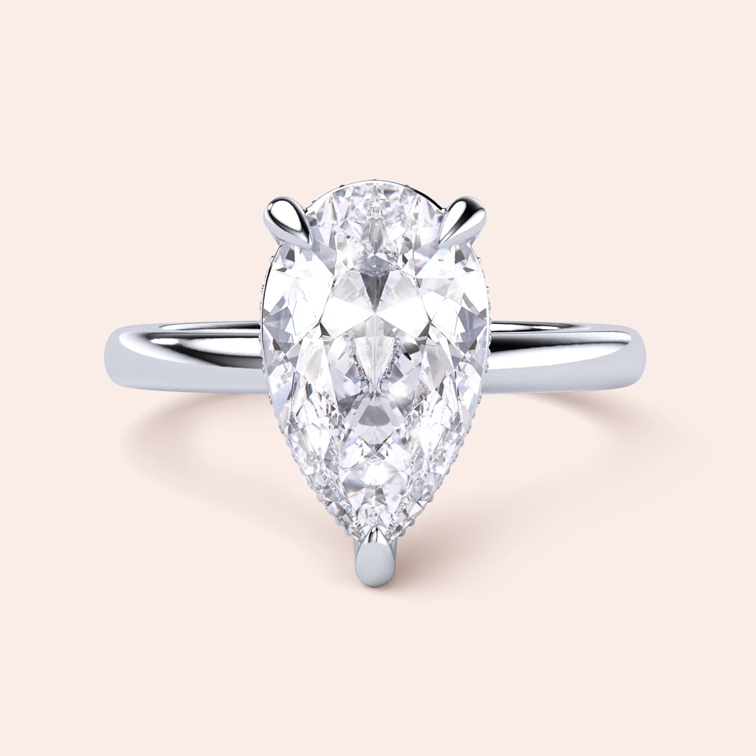 Pear-shaped diamond engagement ring in a sleek 14K or 18K white gold band, showcasing timeless elegance and brilliance. |

#14KRecycledWhiteGold
#18KRecycledWhiteGold








#Platinum
