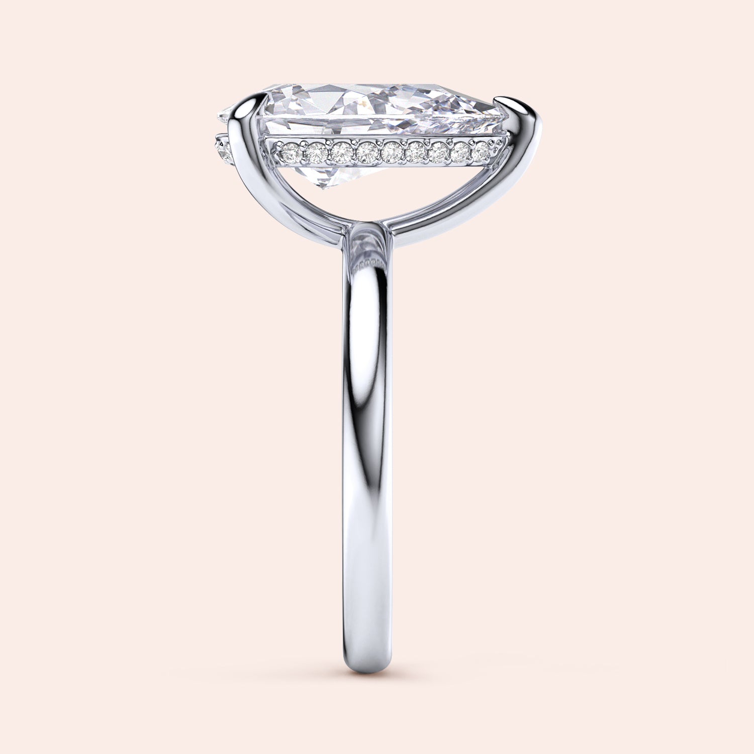 Close-up side view of a white gold engagement ring featuring a marquise-cut diamond andPave diamonds, available in 14K and 18K. |

#14KRecycledWhiteGold
#18KRecycledWhiteGold
#Platinum