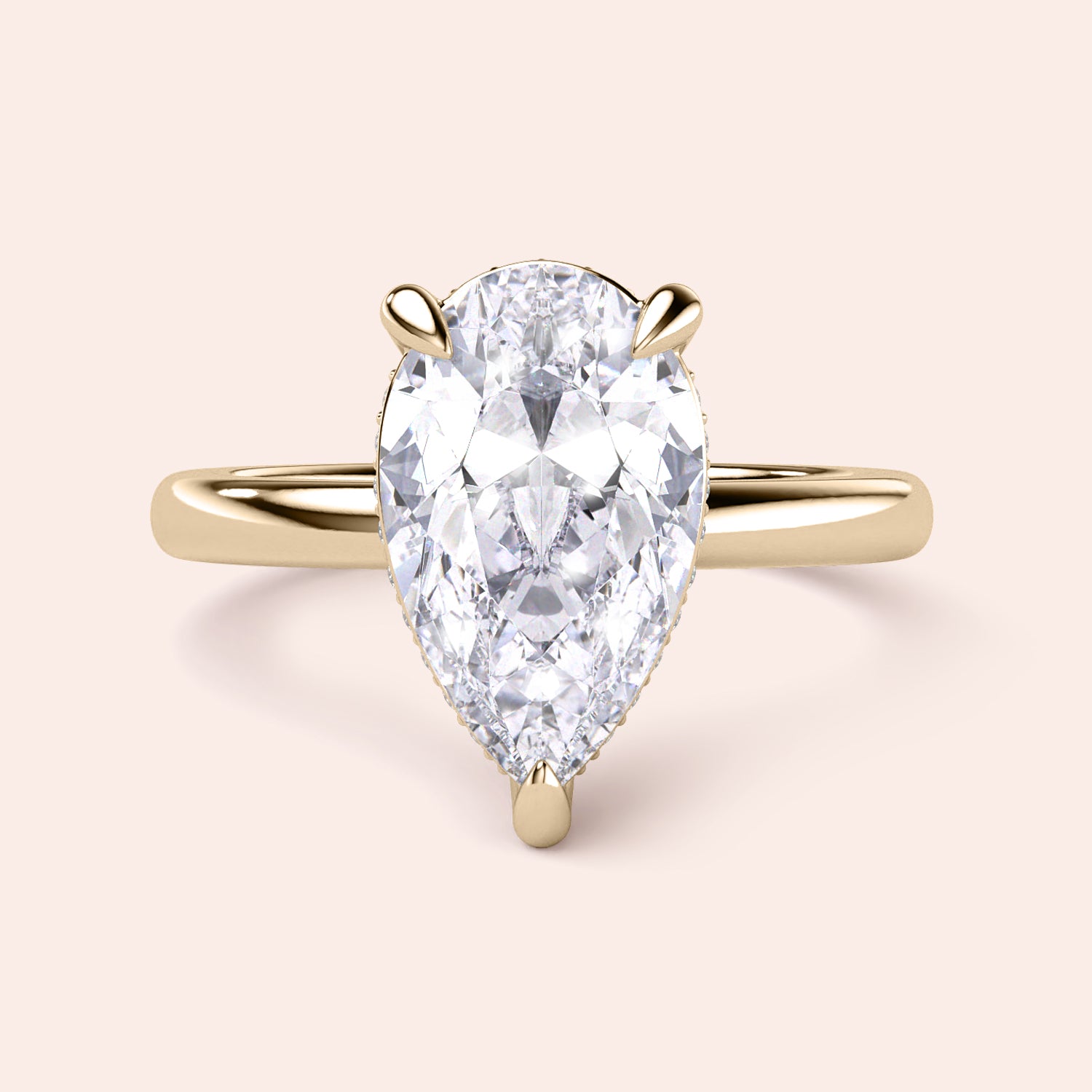 Elegant pear-shaped diamond engagement ring in 14K gold, highlighted on a neutral background for a stunning display. |




#14KRecycledYellowGold
#18KRecycledYellowGold





