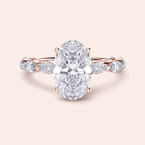 Elegant 14K rose gold engagement ring with oval-cut diamond center, flanked by sparkling side diamonds. Perfect for your love.