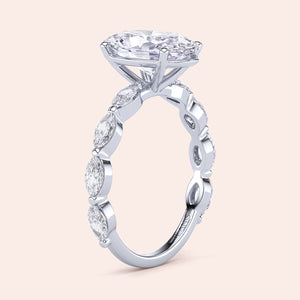 Elegant 14K/18K gold engagement ring with marquise-cut diamond and round diamonds, perfect for a timeless proposal.