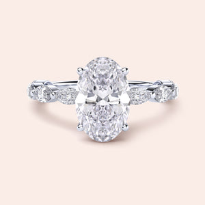 Elegant 14K/18K Gold or Platinum Oval Diamond Engagement Ring with Round and Marquise Accents. Perfect for timeless proposals.