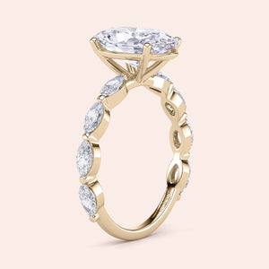 Elegant 14K or 18K gold engagement ring with East-West oval diamond and marquise side stones, perfect for special occasions.