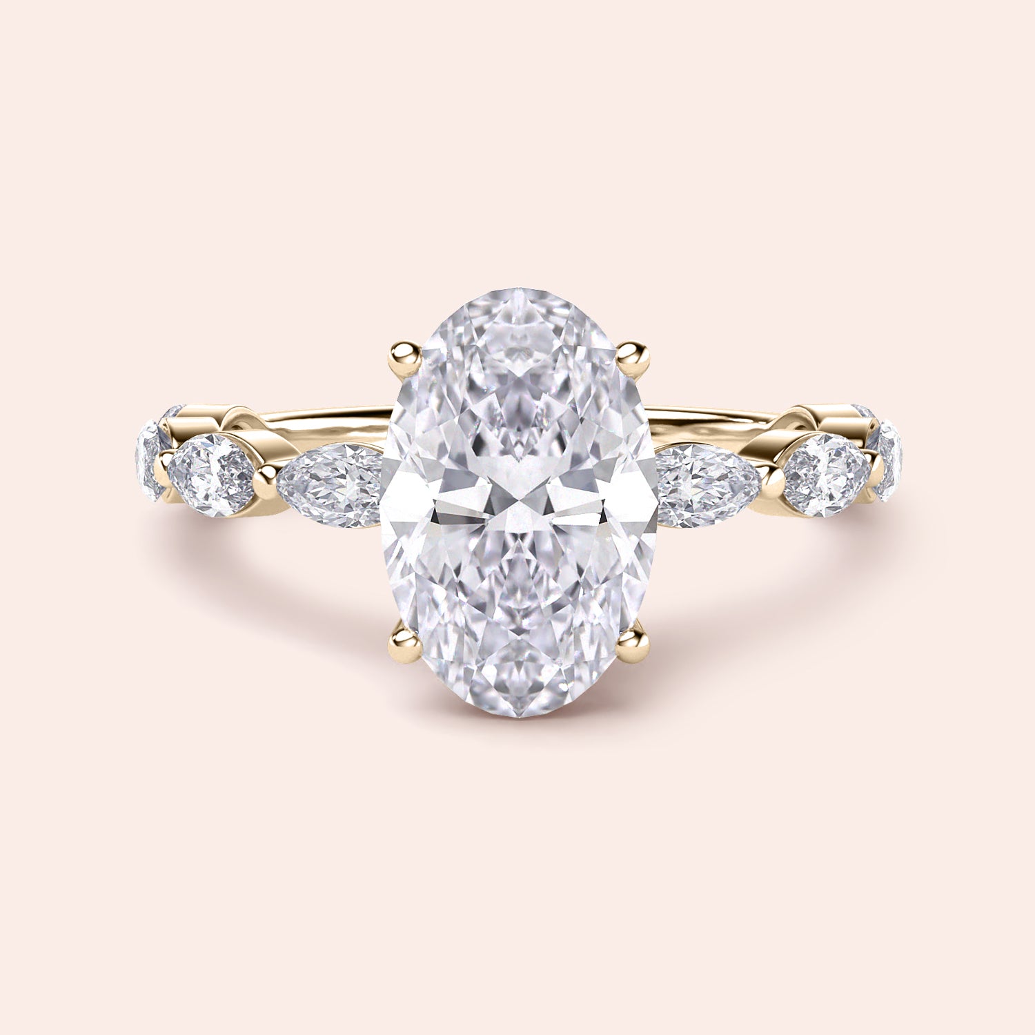 Elegant yellow gold engagement ring featuring an oval diamond and marquise side stones, available in 14K and 18K gold or platinum.|




#14KRecycledYellowGold
#18KRecycledYellowGold





