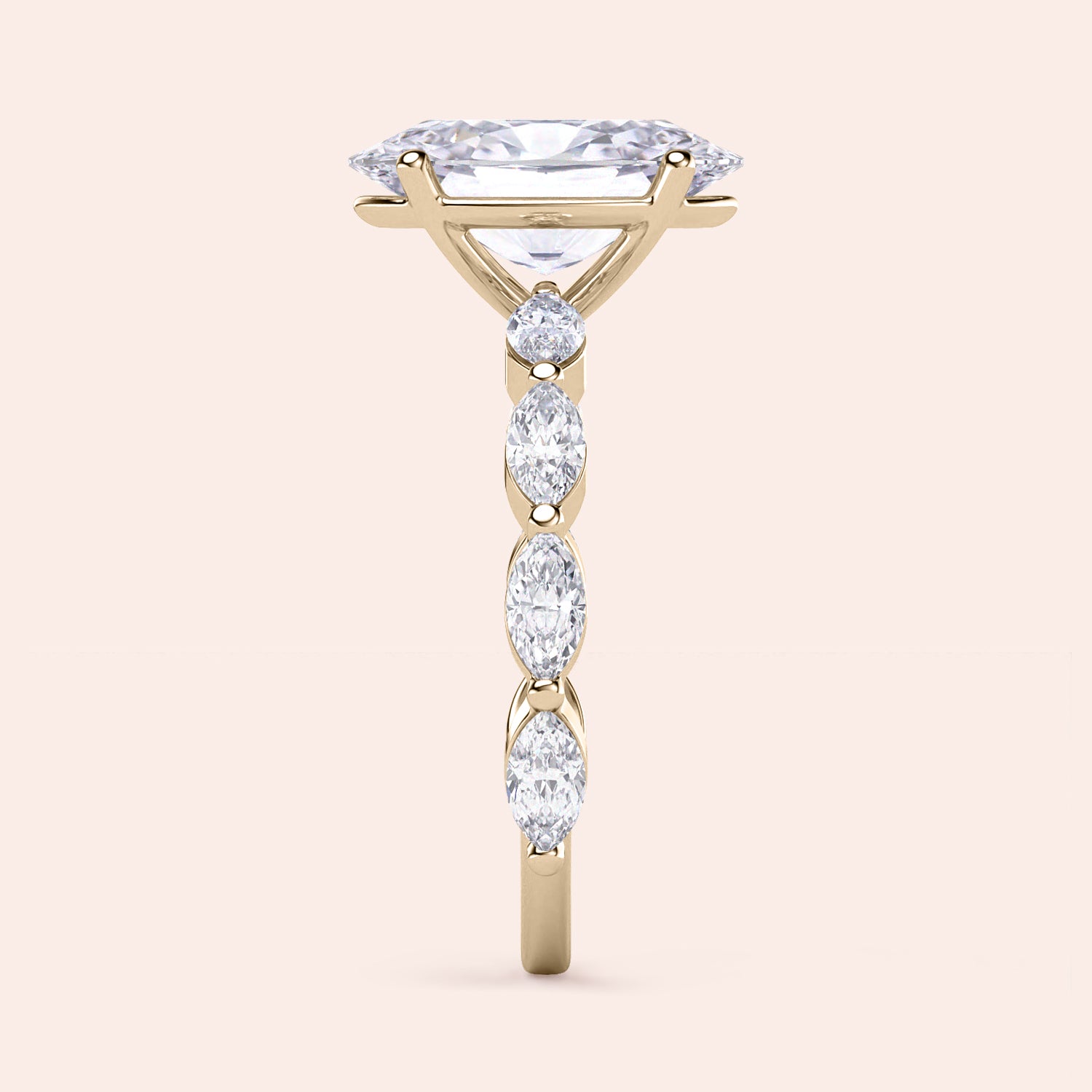 14K gold engagement ring with marquise-shaped diamond and side stones, elegantly designed for a timeless appeal.|




#14KRecycledYellowGold
#18KRecycledYellowGold





