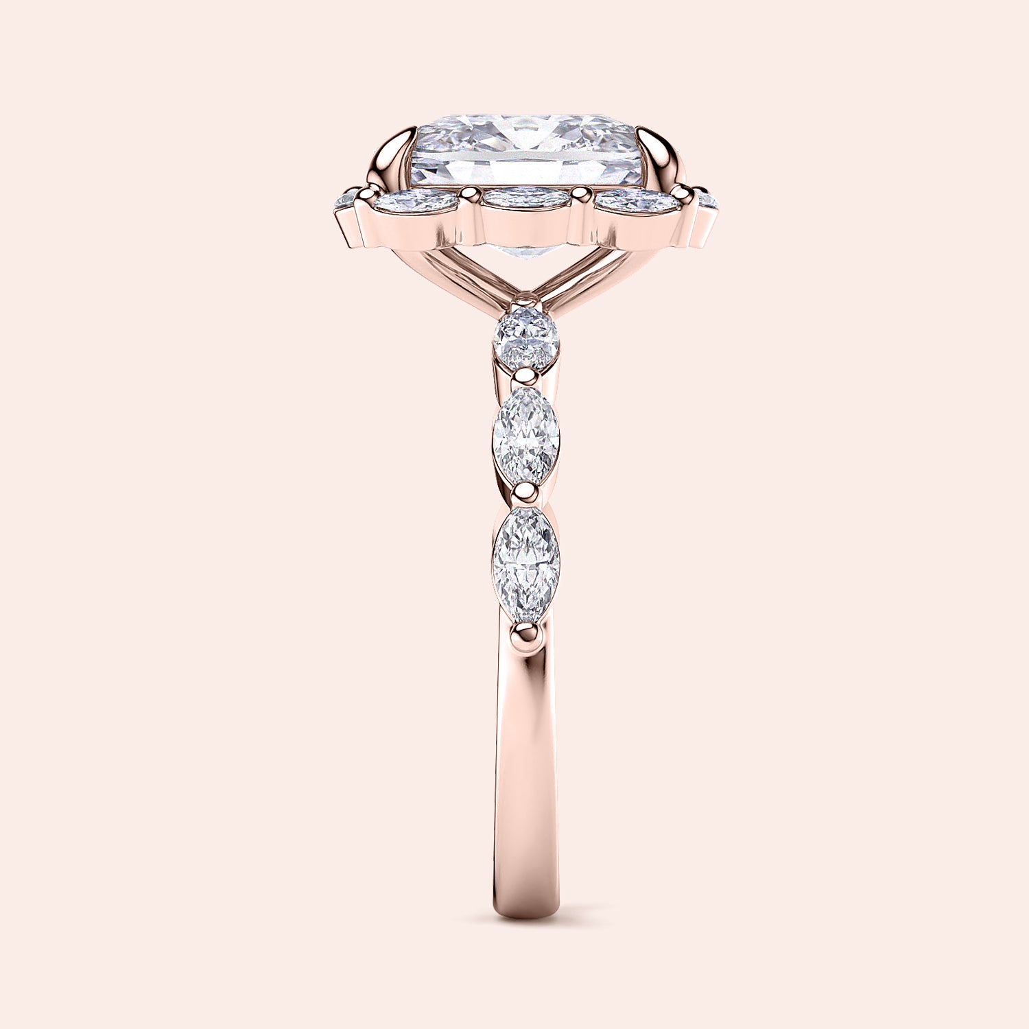 Elegant rose gold engagement ring with radiant-cut diamond and marquise side stones, available in 14K, 18K, or platinum.|







#14KRecycledRoseGold
#18KRecycledRoseGold


