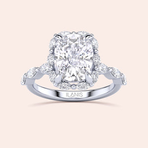 Elegant cushion-cut diamond engagement ring in 14K or 18K gold or platinum with halo setting and intricate band details.