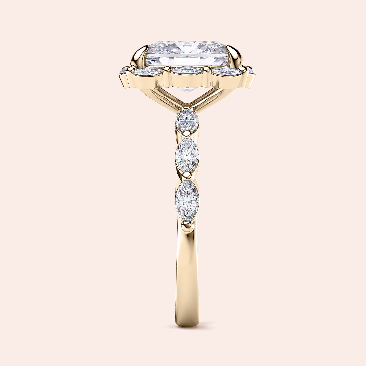 Elegant 14K yellow gold engagement ring with radiant cut diamond center and marquise accents, displayed without a model.|




#14KRecycledYellowGold
#18KRecycledYellowGold





