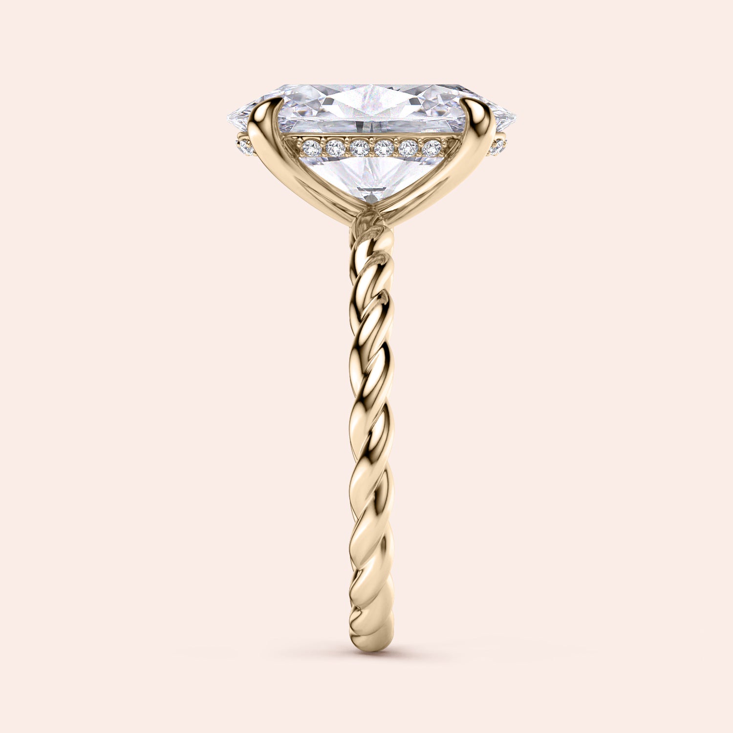 Elegant oval twisted band engagement ring in 14K or 18K gold or platinum, featuring a halo of diamonds beneath the center stone.|




#14KRecycledYellowGold
#18KRecycledYellowGold





