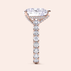 Close-up of a stunning 14K or 18K rose gold oval-shaped diamond engagement ring withPave band and halo accents.