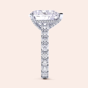 Elegant 14K white gold engagement ring with emerald-cut diamond, halo accents, and sparkling band, perfect for proposals.