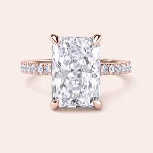 Radiant cut diamond engagement ring in 14K rose gold with pave band, perfect for timeless elegance and sparkle.
