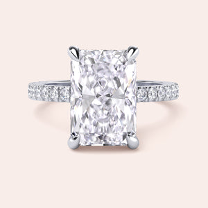 Radiant cut diamond engagement ring in 14K or 18K white gold or platinum with Pave diamond band, front view.